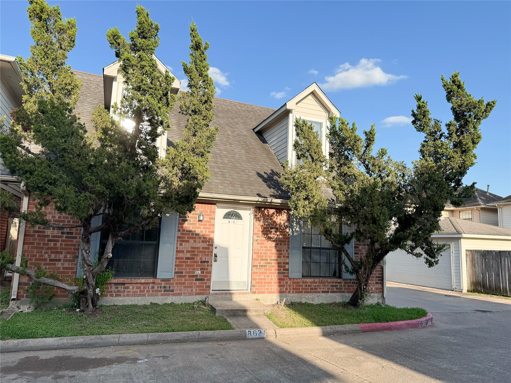8631 Mapletwist Street Houston, TX 77083 - Photo 2 of 25 a front view of a house with a yard and tree s