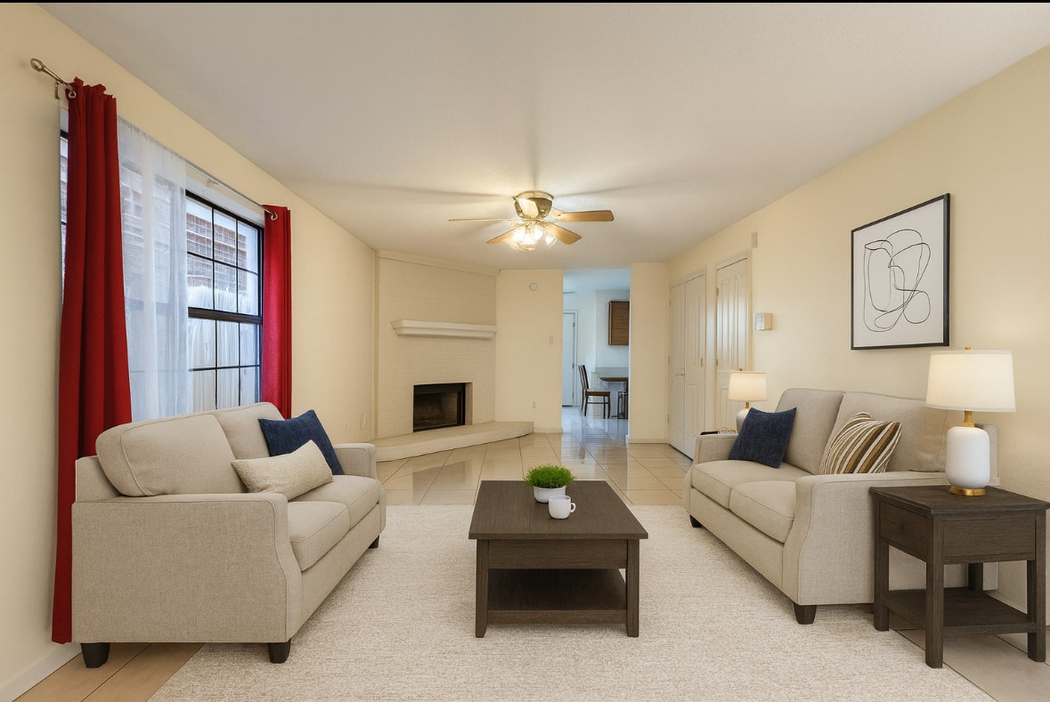 8631 Mapletwist Street Houston, TX 77083 - Photo 4 of 25 a living room with furniture and a fireplace