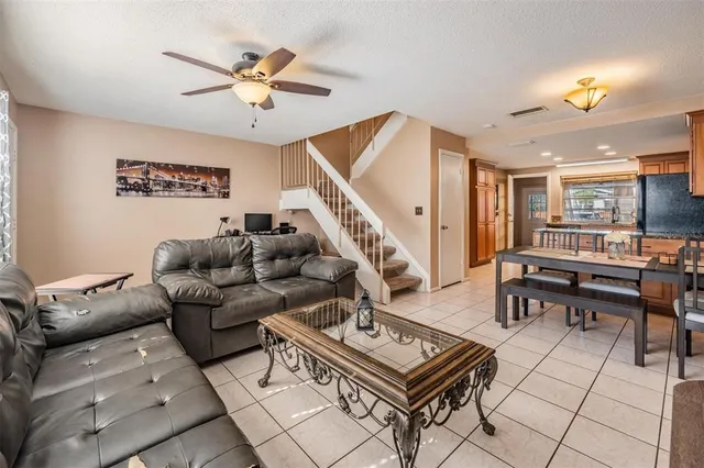 a living room with furniture and a table