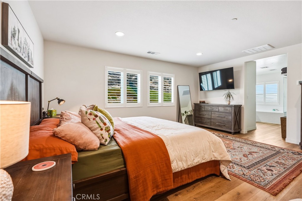 29853 White Ridge Road Winchester, CA 92596 - Photo 32 of 61 Primary Suite with vinyl plank floors and shutters