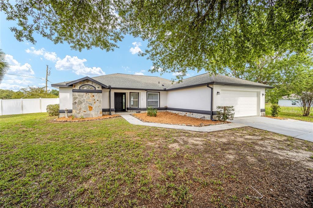 16190 Southwest 16th Court Ocala, FL 34473 - Photo 1 of 1 a view of a house with pool and chairs