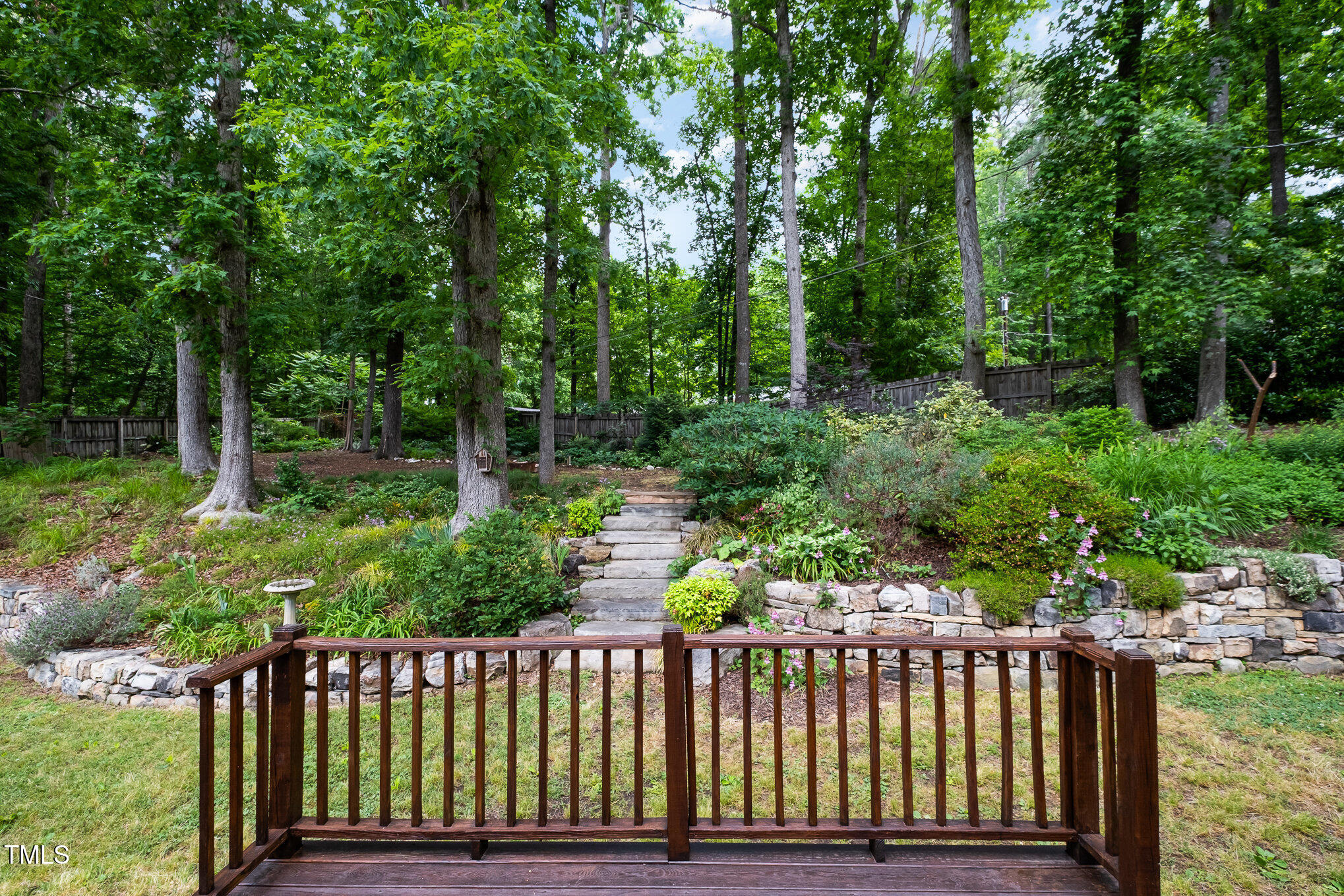 606 Chalice Street Durham, NC 27705 - Photo 20 of 41 a view of a deck with a trees