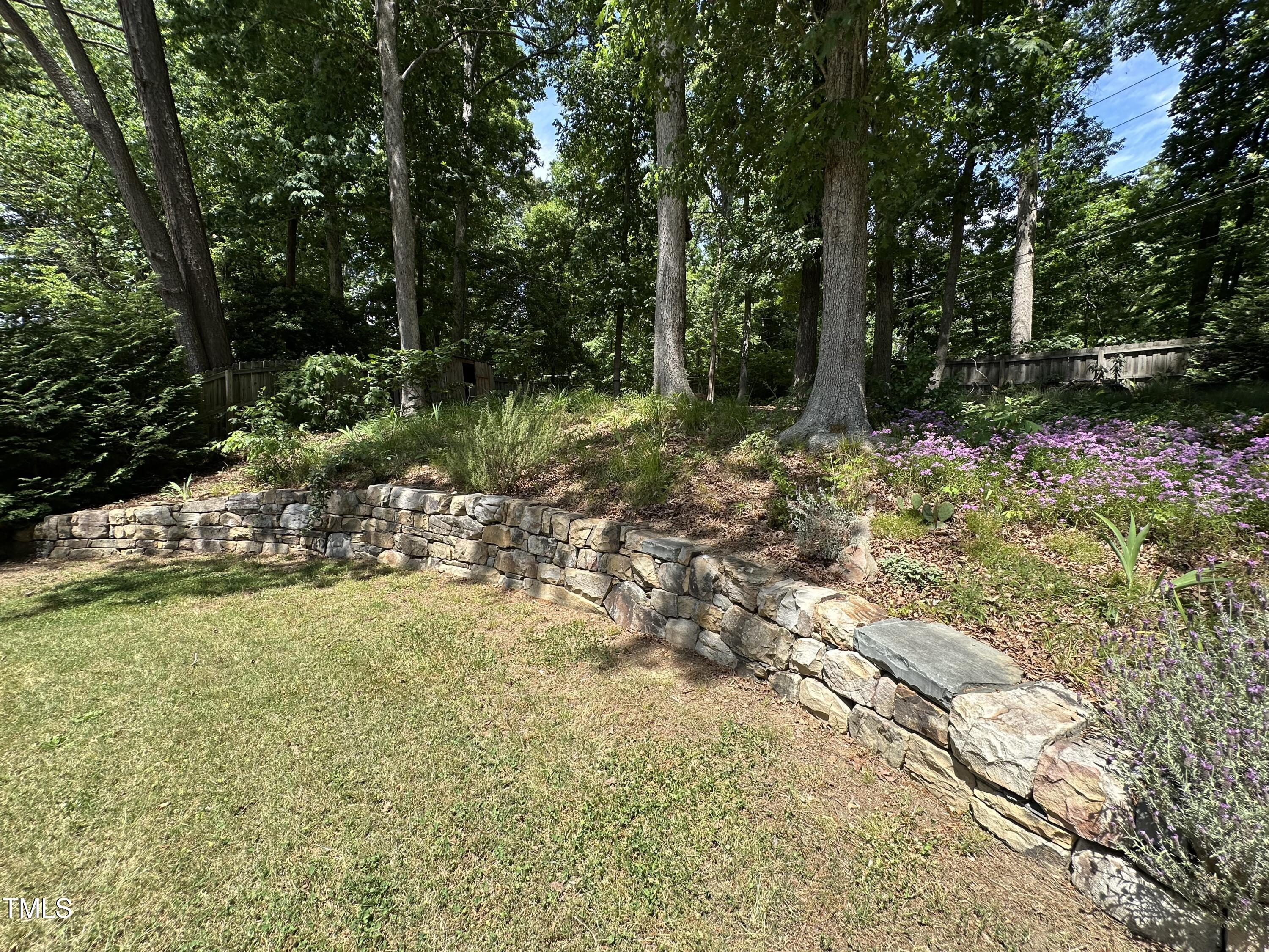606 Chalice Street Durham, NC 27705 - Photo 28 of 41 a view of a tree with a yard