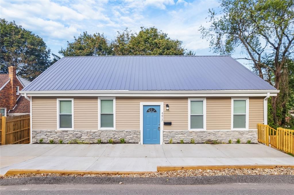 front view of a house and a yard