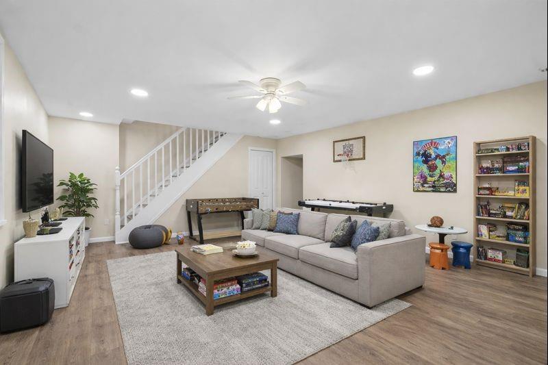 4617 Mt Troy Rd Extension Pittsburgh, PA 15214 - Photo 14 of 19 a living room with furniture and a flat screen tv