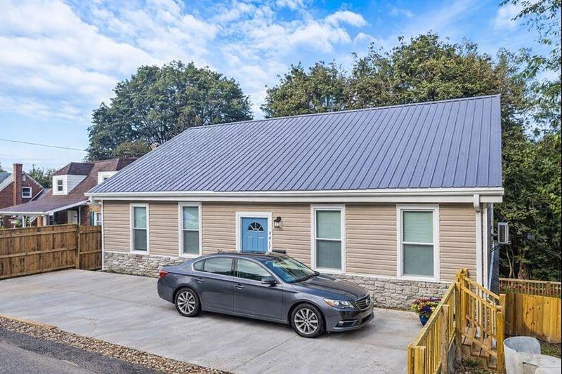 4617 Mt Troy Rd Extension Pittsburgh, PA 15214 - Photo 2 of 19 a car parked in front of a house