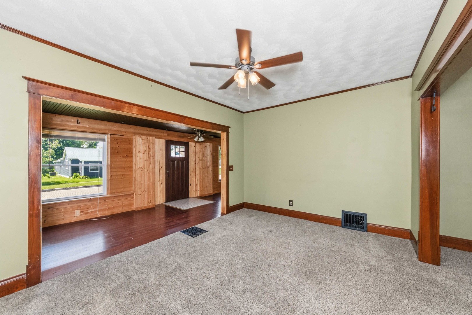 412 West 5th Street Minonk, IL 61760 - Photo 3 of 23 an empty room with windows