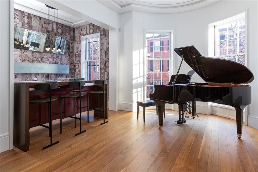21 Chestnut Street Boston, MA 02108 - Photo 12 of 24 a living room with furniture and a wooden floor