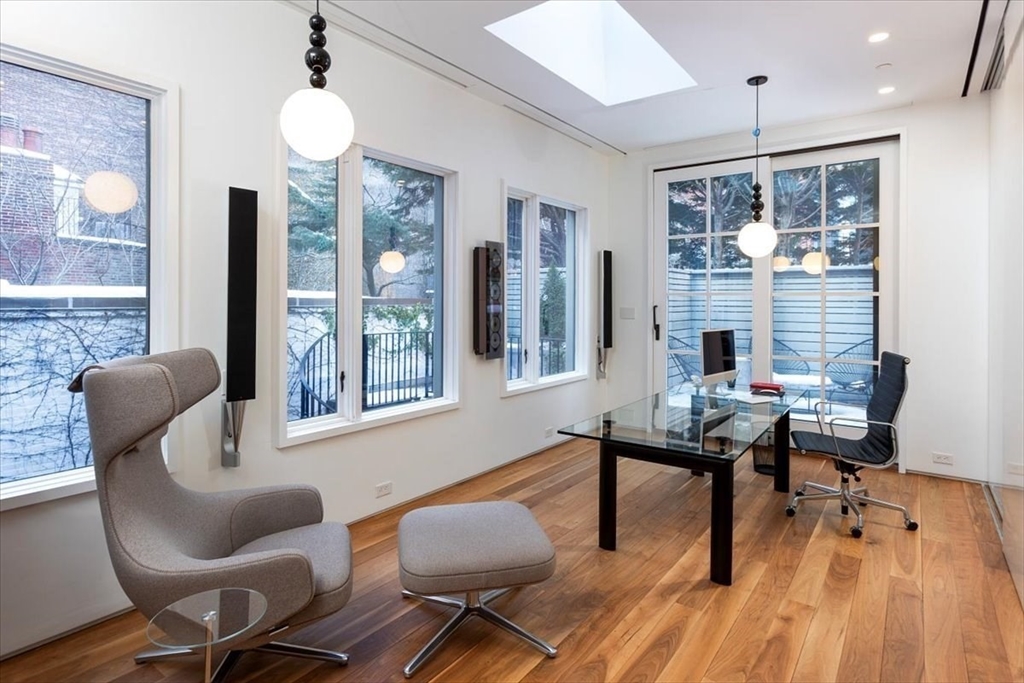 21 Chestnut Street Boston, MA 02108 - Photo 15 of 24 a reading room with furniture and wooden floor