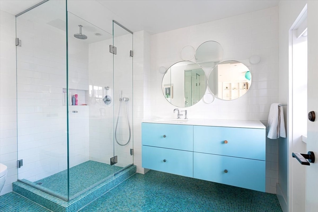 21 Chestnut Street Boston, MA 02108 - Photo 21 of 24 a bathroom with a shower sink and mirror