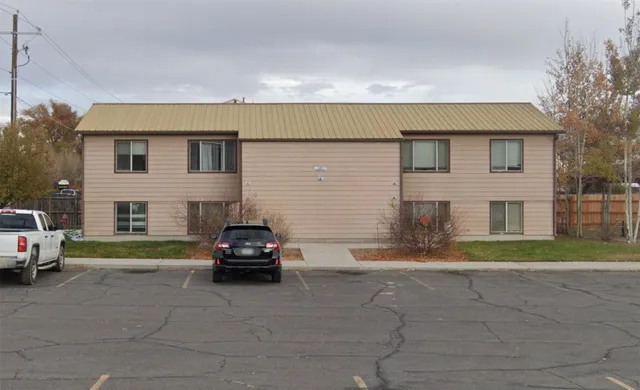 a car parked in front of a house