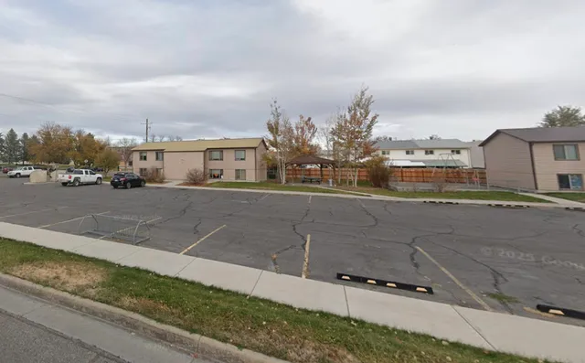 a house with a tree in front of it