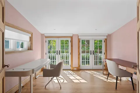 a bathroom with a shower curtain and a sink