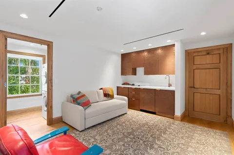 a large bed in a white room