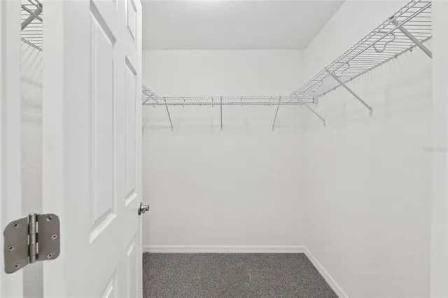 a view of small space with racks on the wall