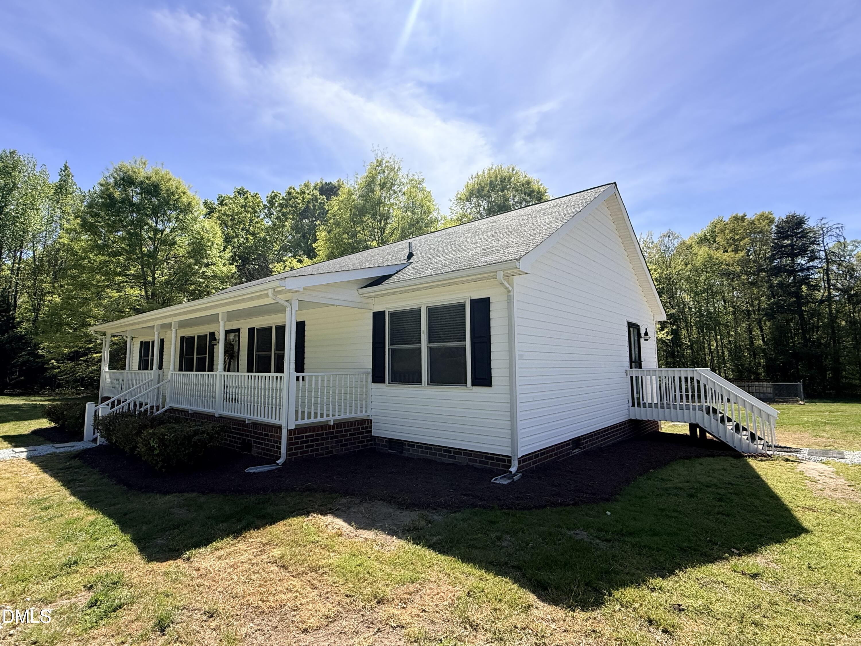 2429 Halifax Road Roxboro, NC 27573 - Photo 53 of 54 a view of a house with a yard