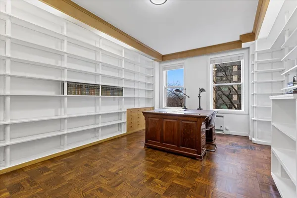 a living room with a furniture and a window