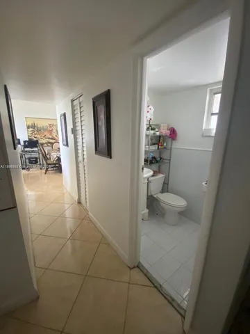 a bathroom with a sink and toilet