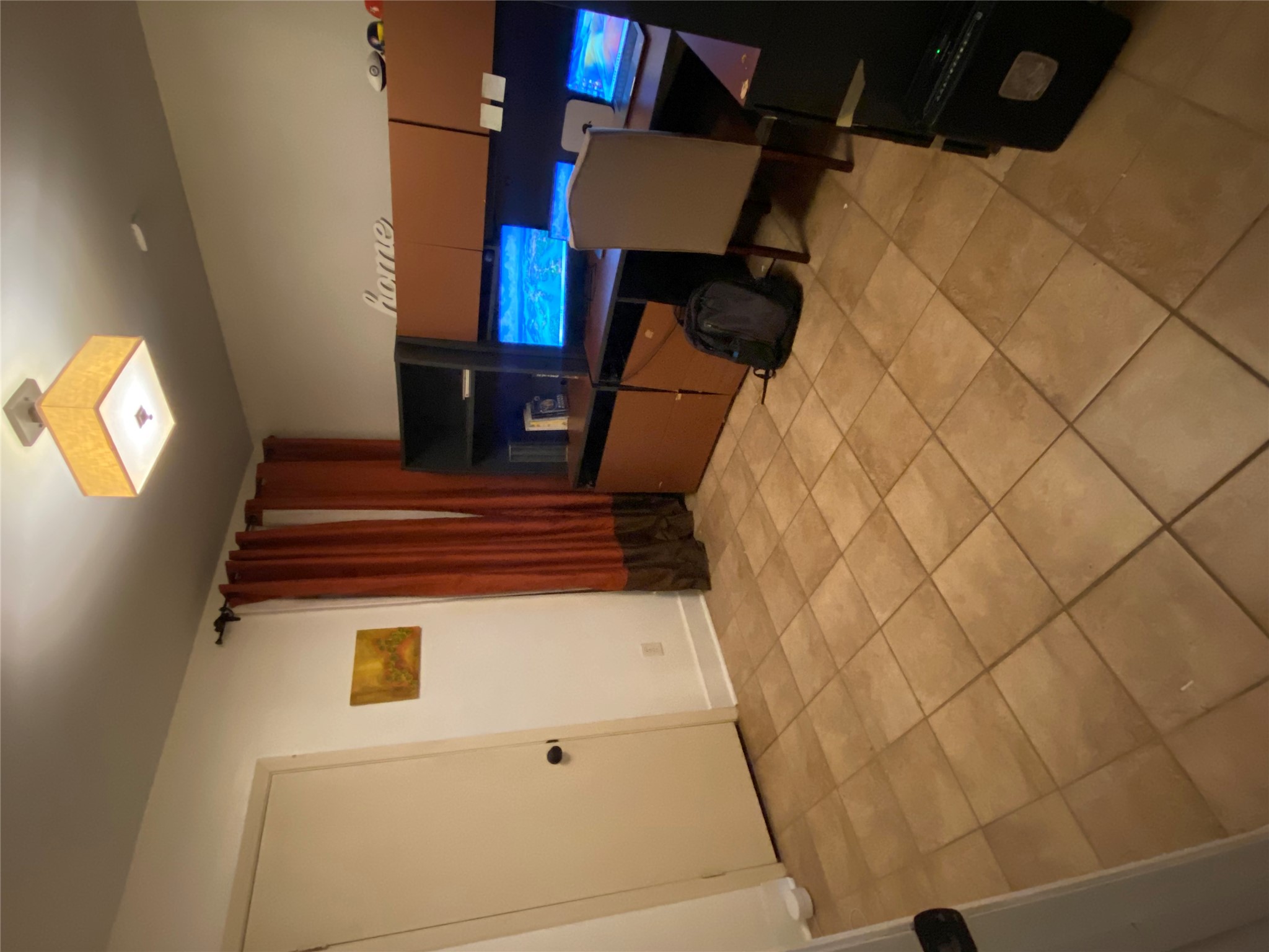 102 Skyloop Drive Austin, TX 78745 - Photo 13 of 18 a bedroom with a bed and a cabinets