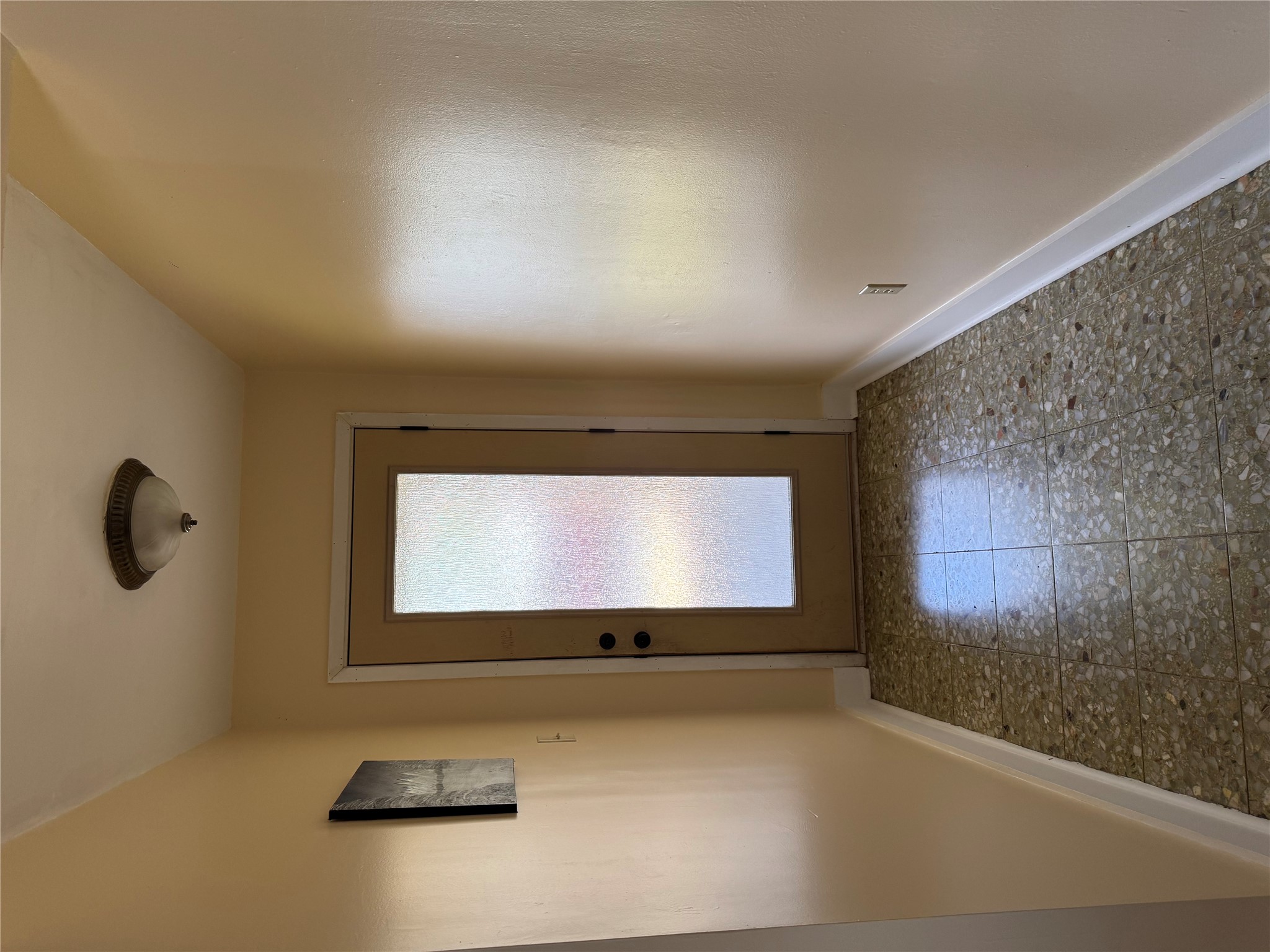 102 Skyloop Drive Austin, TX 78745 - Photo 2 of 18 an empty room with windows