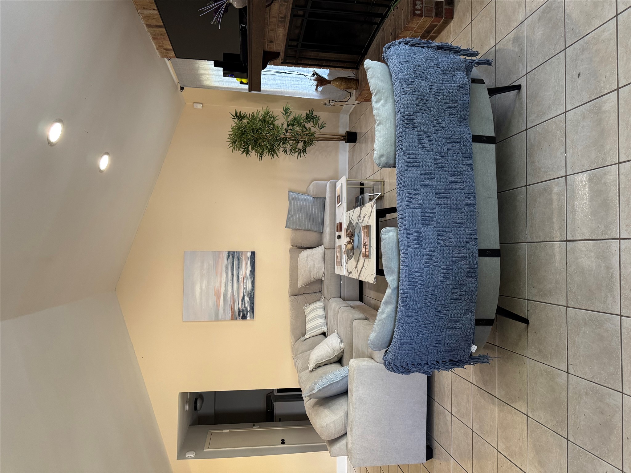 102 Skyloop Drive Austin, TX 78745 - Photo 4 of 18 a living room with furniture and a flat screen tv