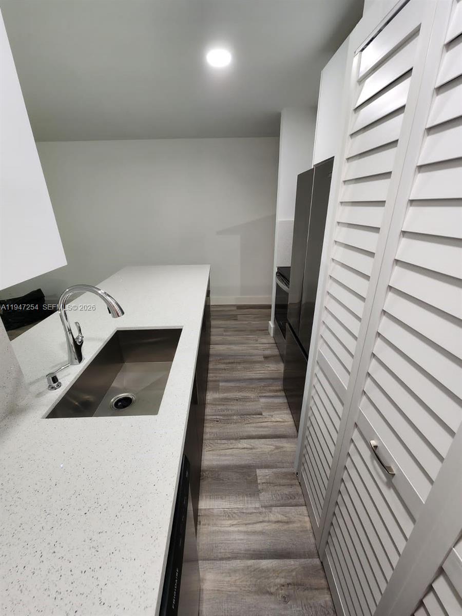 4545 Treehouse Lane, Unit H Tamarac, FL 33319 - Photo 7 of 18 a view of entryway and hall