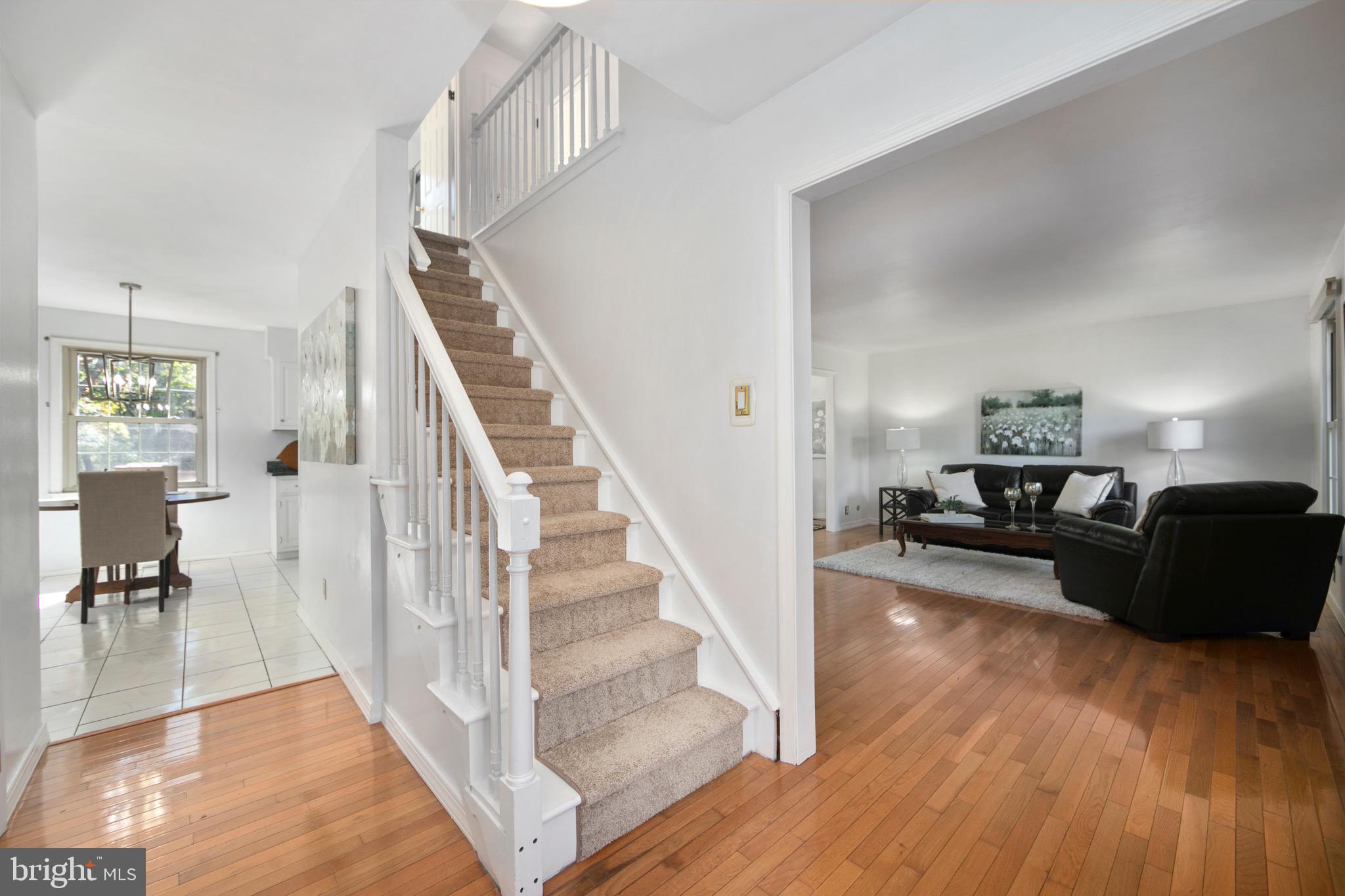 219 Dock Road Marlton, NJ 08053 - Photo 3 of 51 a living room with furniture and a wooden floor