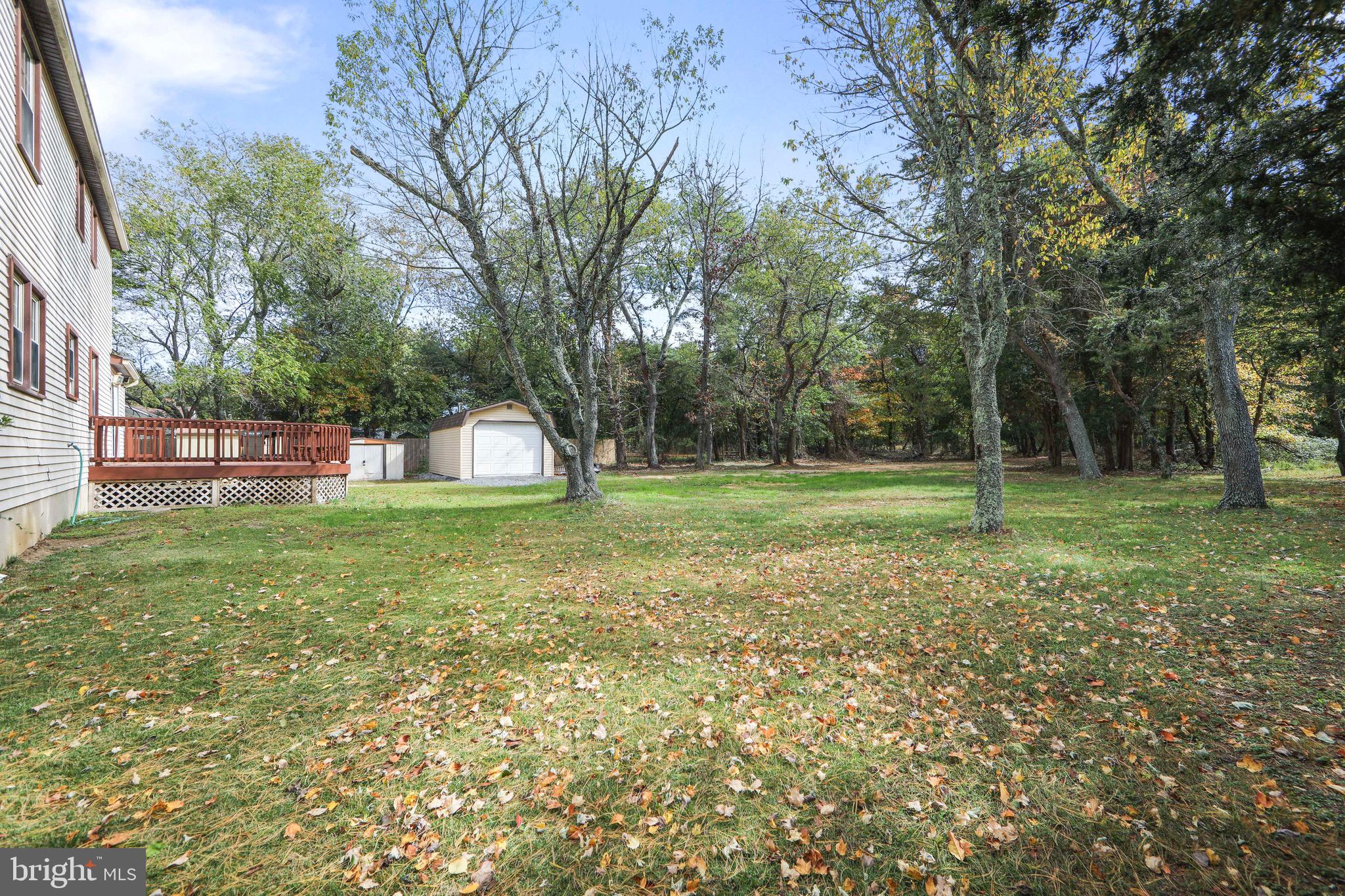 219 Dock Road Marlton, NJ 08053 - Photo 40 of 51 a backyard of a house with lots of green space