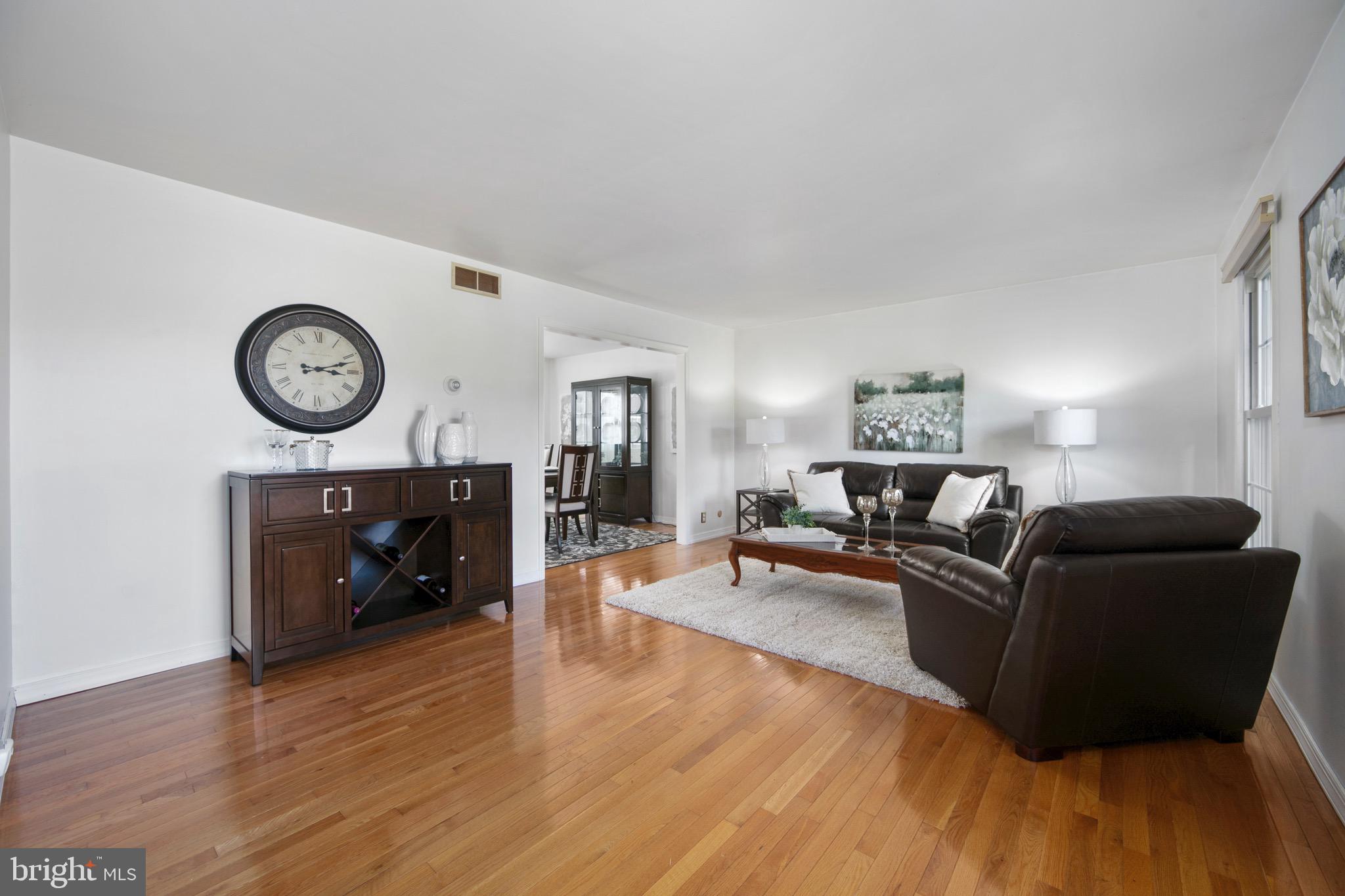 219 Dock Road Marlton, NJ 08053 - Photo 4 of 51 a living room with furniture and a fireplace
