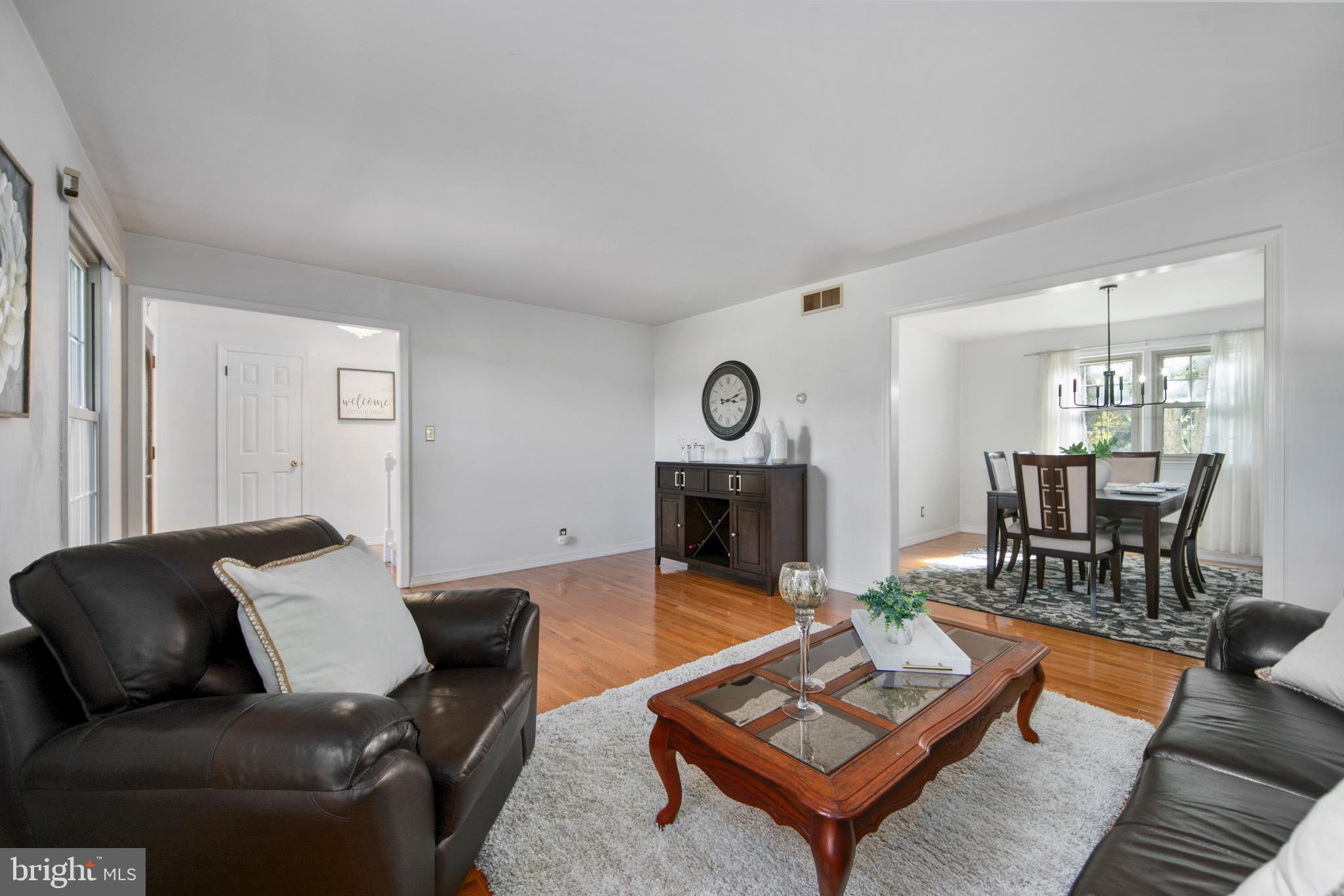 219 Dock Road Marlton, NJ 08053 - Photo 6 of 51 a living room with furniture and a fireplace