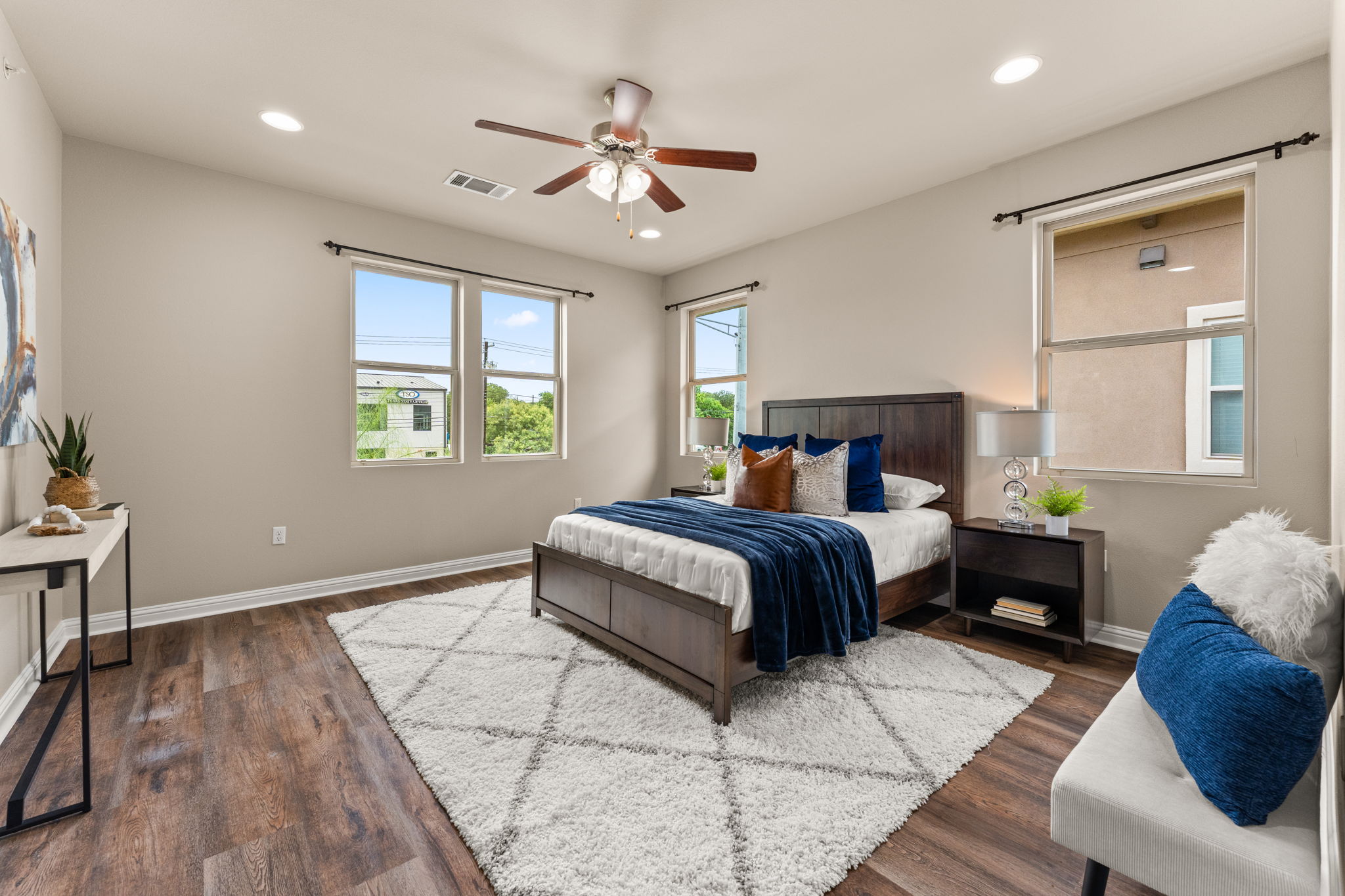 6814 East Riverside Drive, Unit 21 Austin, TX 78741 - Photo 15 of 35 a bedroom with a large bed and a window