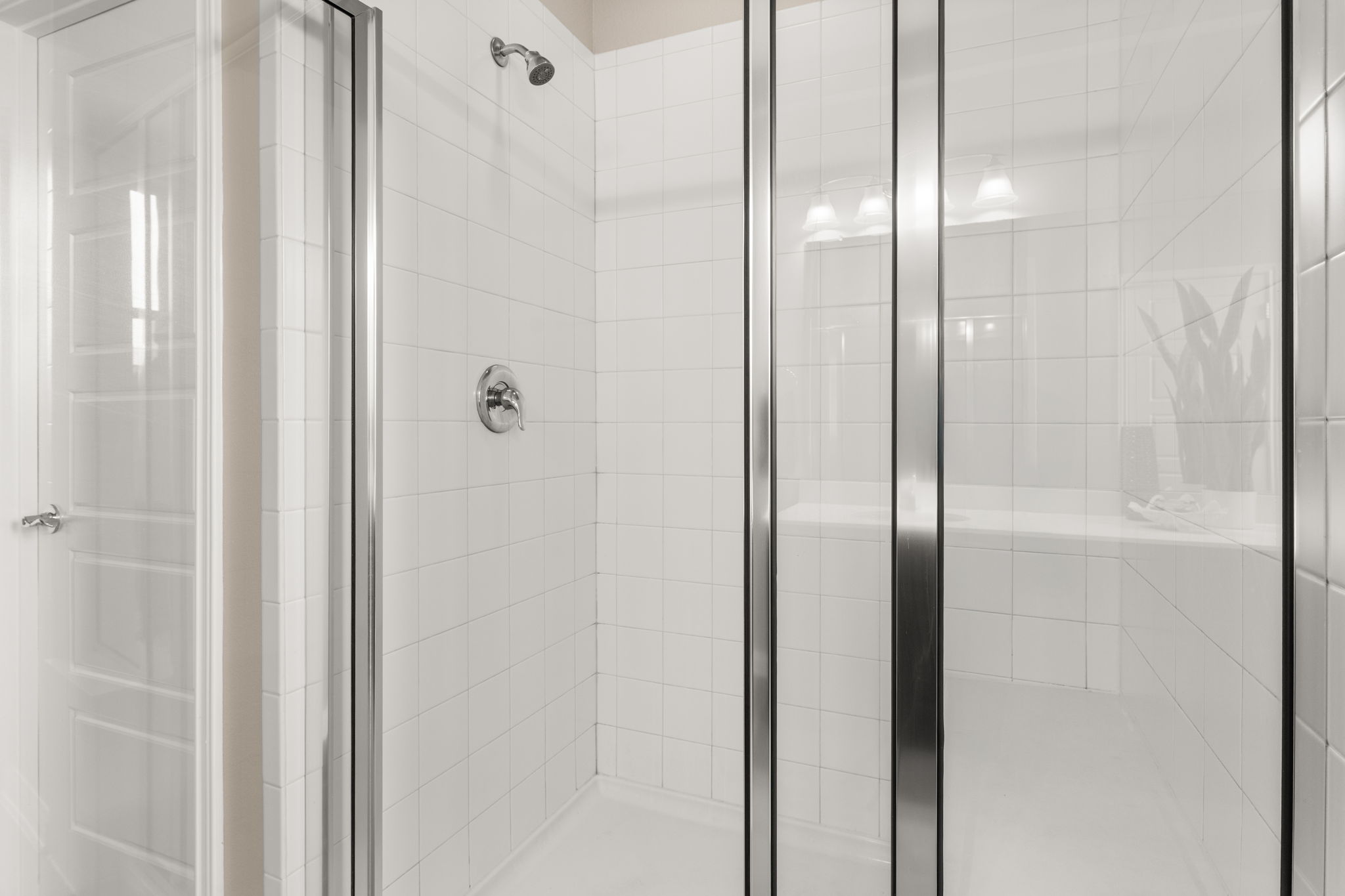 6814 East Riverside Drive, Unit 21 Austin, TX 78741 - Photo 17 of 35 a bathroom with a glass shower door
