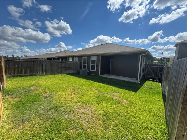 a view of a backyard with a garden
