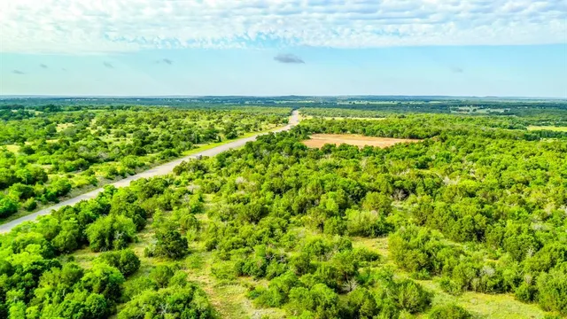 a view of a yard with an outdoor space