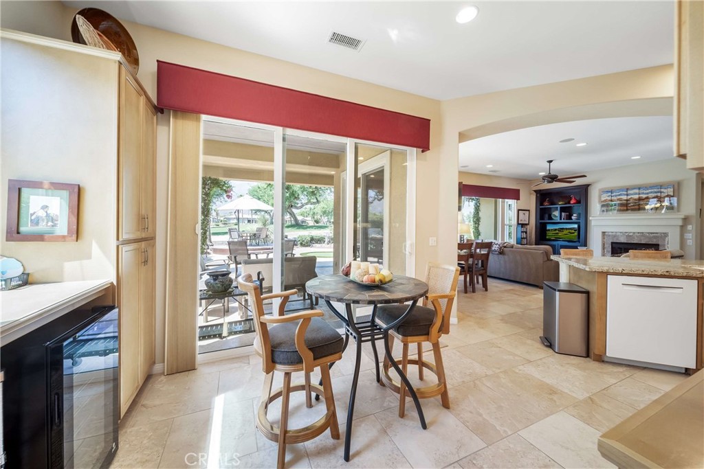 81955 Golden Star Way La Quinta, CA 92253 - Photo 15 of 54 a view of a dining room with furniture window and outside view