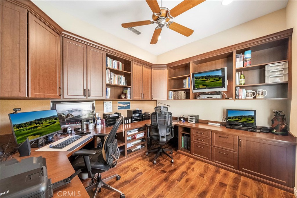 81955 Golden Star Way La Quinta, CA 92253 - Photo 25 of 54 a kitchen with stainless steel appliances granite countertop sink stove top oven and cabinets