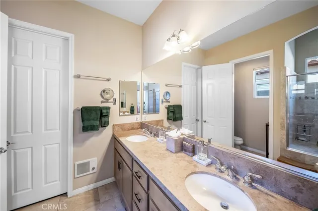 a bathroom with a shower and a sink