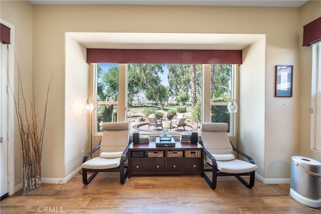 81955 Golden Star Way La Quinta, CA 92253 - Photo 34 of 54 a living room with furniture and a large window