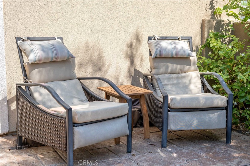 81955 Golden Star Way La Quinta, CA 92253 - Photo 40 of 54 a bedroom with furniture and a potted plant