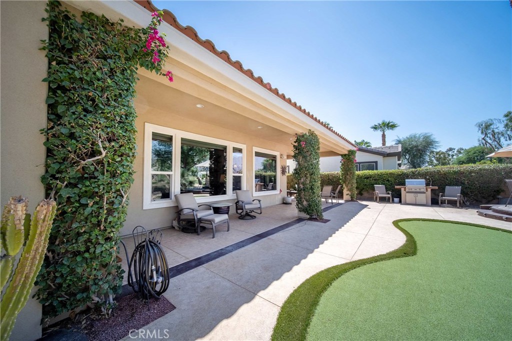 81955 Golden Star Way La Quinta, CA 92253 - Photo 41 of 54 a view of a house with swimming pool and sitting area