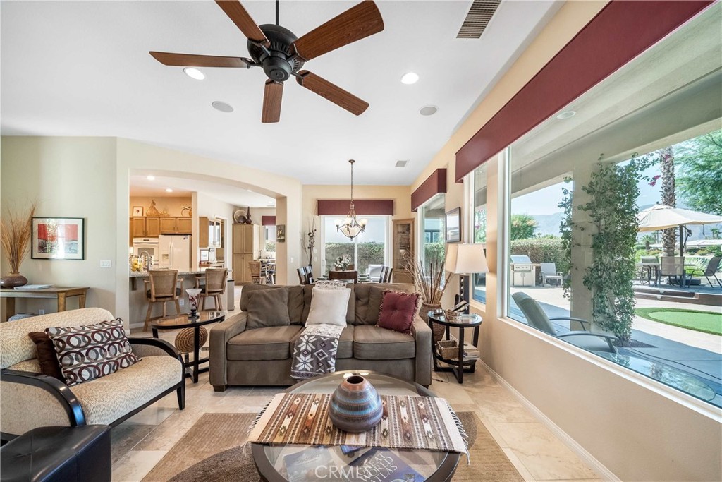 81955 Golden Star Way La Quinta, CA 92253 - Photo 5 of 54 a living room with furniture and a large window