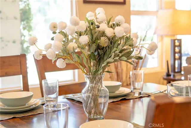 a vase of flowers sitting on a table