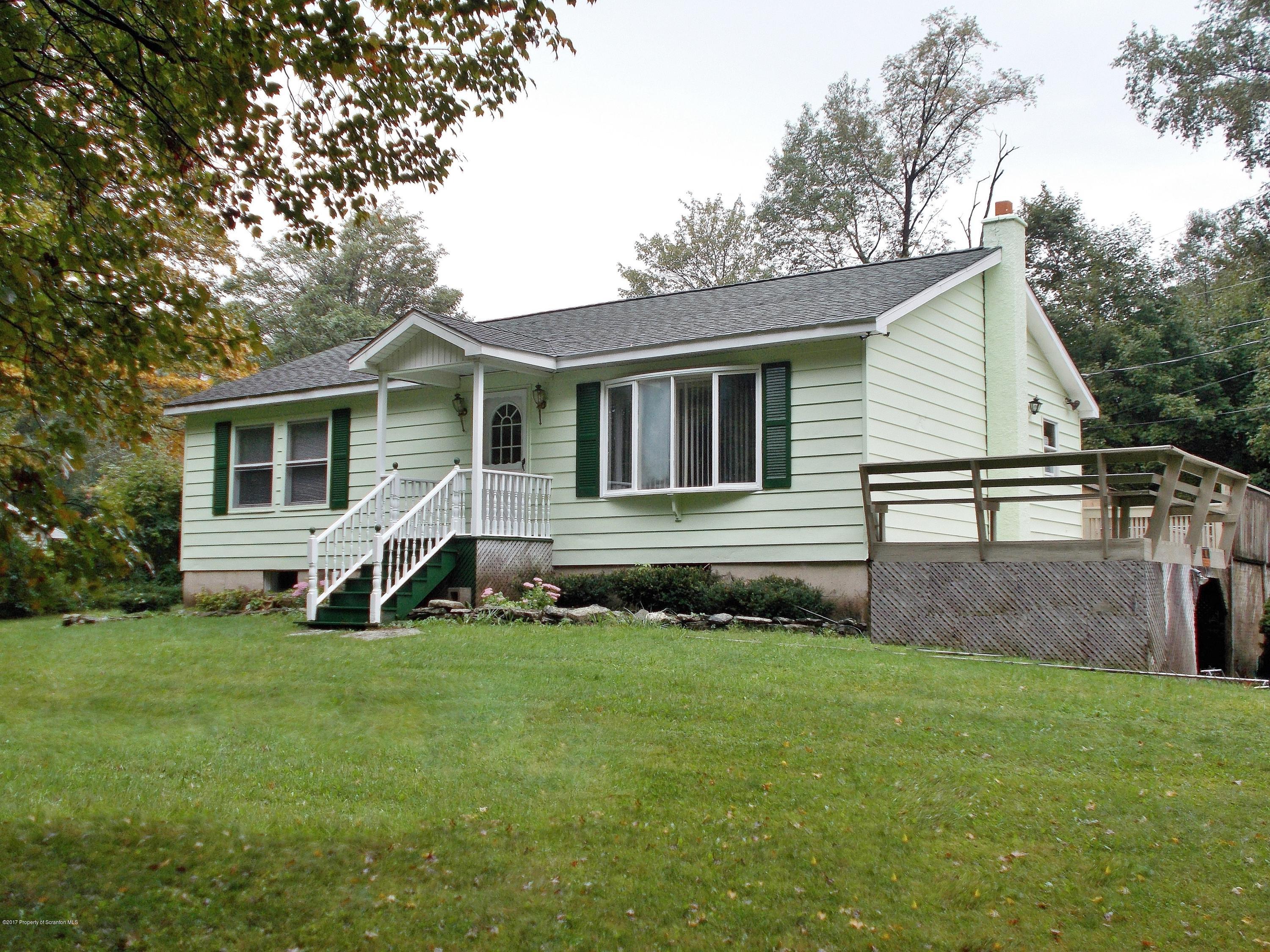 6 Watrees Rd Spring Brook Springfield, NJ 07081 - Photo 1 of 23 a view of a house with a yard and sitting area