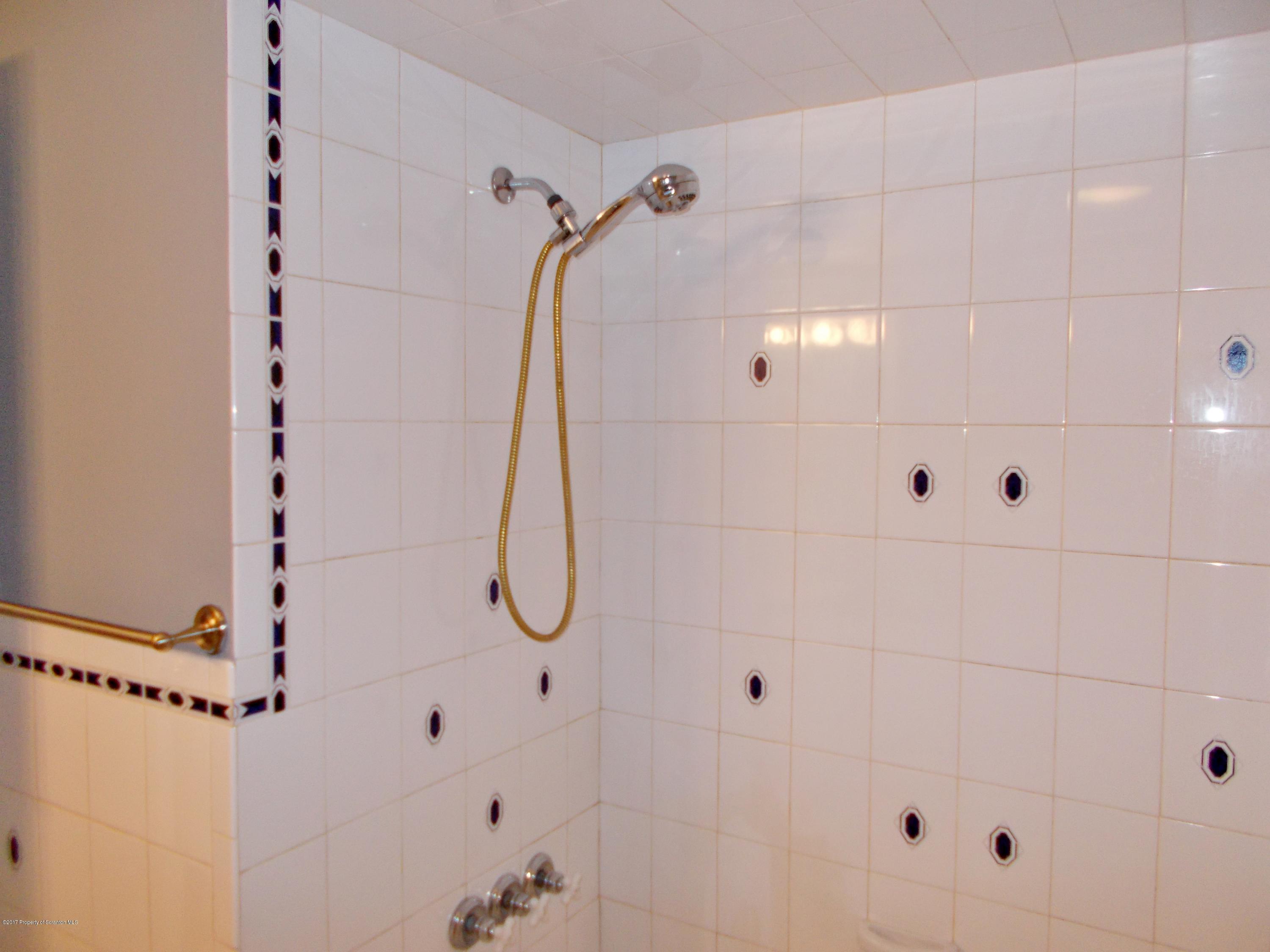 6 Watrees Rd Spring Brook Springfield, NJ 07081 - Photo 19 of 23 a view of a bathroom shower