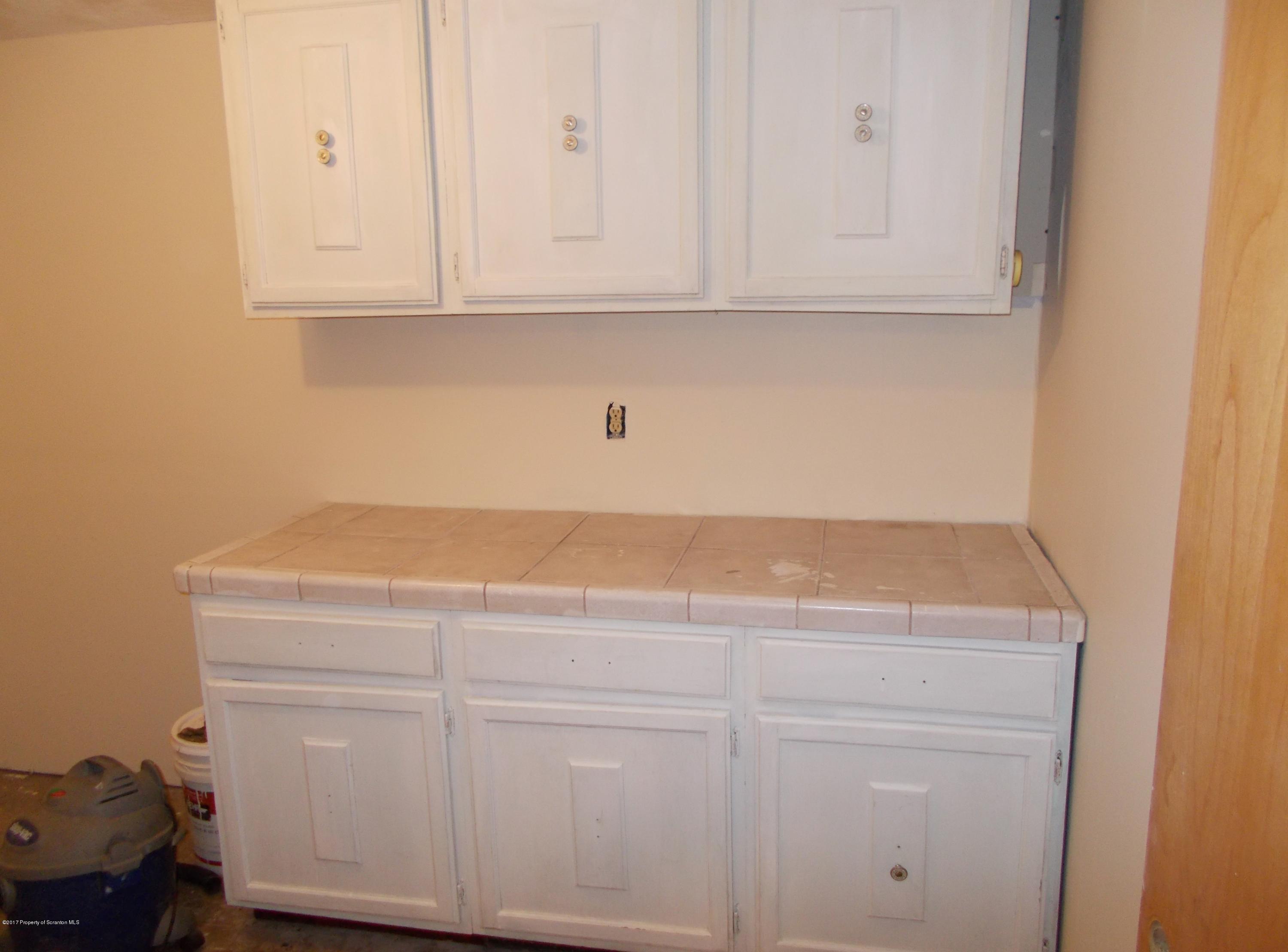 6 Watrees Rd Spring Brook Springfield, NJ 07081 - Photo 7 of 23 a view of cabinets and wooden floor