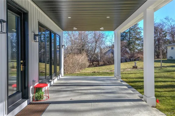 a view of a porch with a swimming pool