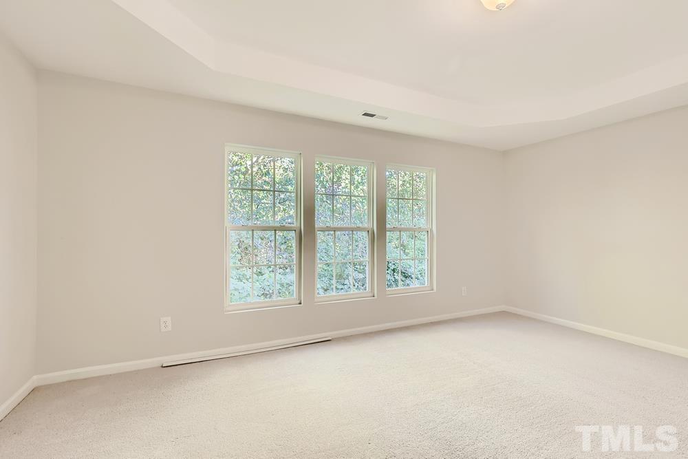 7010 Racine Way Raleigh, NC 27690 - Photo 14 of 27 an empty room with a window