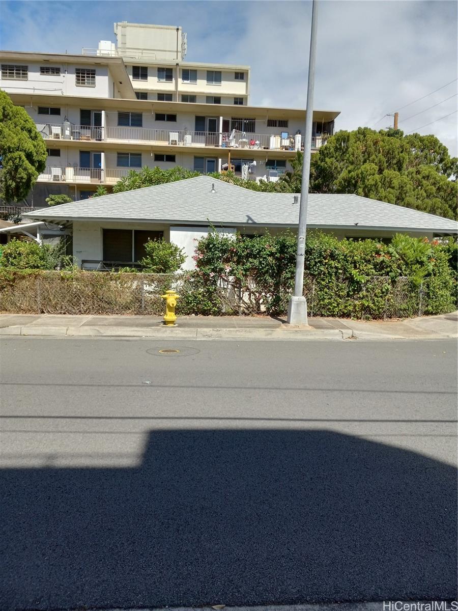 a front view of a building with street view