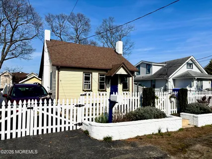 a front view of a house with a porch