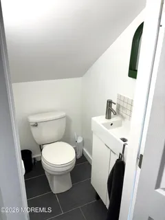 a bathroom with a sink and a toilet